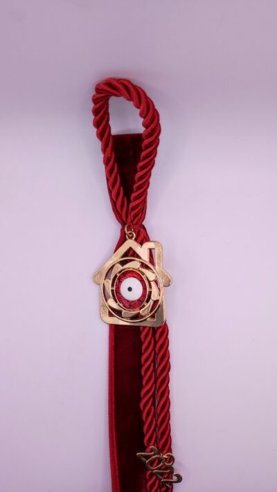 Handmade charm with house and eye